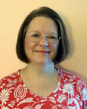 Professional headshot of Kathy Daley