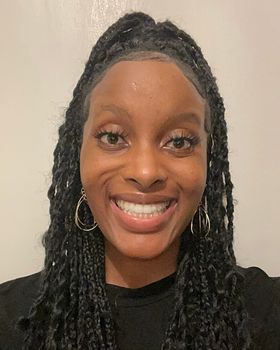 Professional headshot of Rene Amsterdam